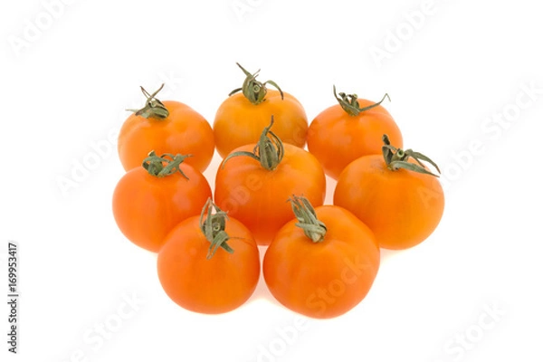 Obraz small orange tomatoes on a white background