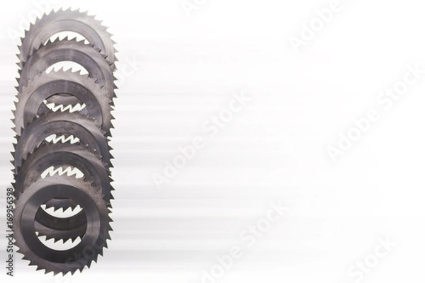 Obraz  Carbide Saws Stacked vertically on a light background