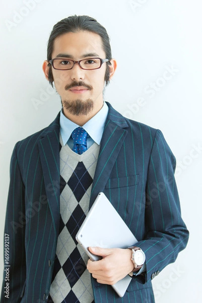 Fototapeta タブレットを持ったビジネスマン