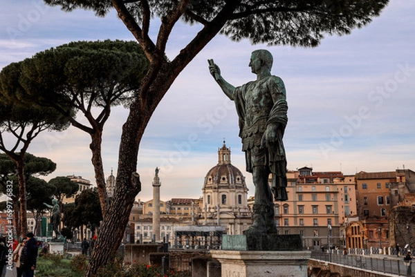 Obraz View of Statue of Roman Emperor Nerva at Roman Forum on famous Via dei Fori Imperial of Rome, Italy. High quality photo