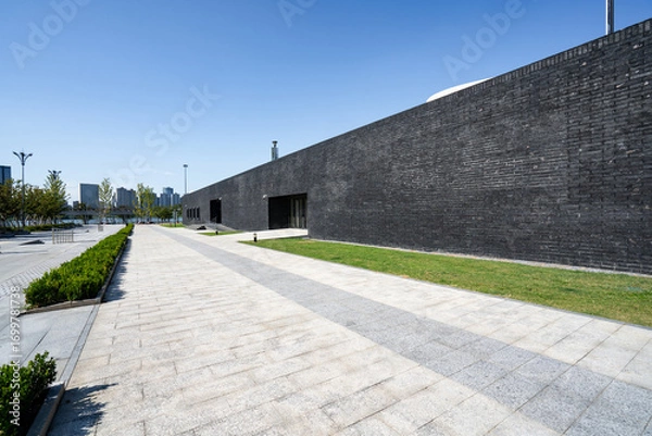 Fototapeta empty brick floor with modern building