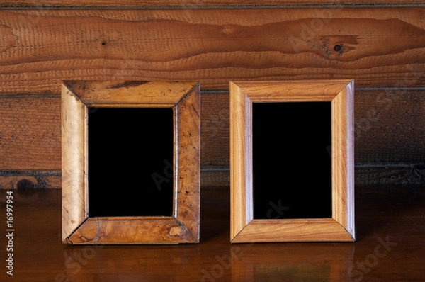 Fototapeta old photo frames on table