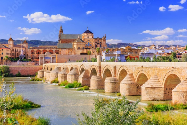 Obraz Cordoba, Spain. Roman Bridge and Mezquita (mosque-cathedral) on the Guadalquivir River.