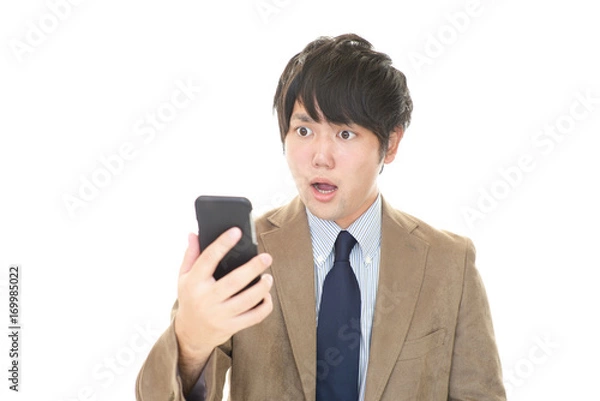 Fototapeta 驚いた表情のビジネスマン