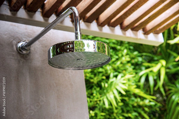 Fototapeta Freshwater bath with circular shower in the garden