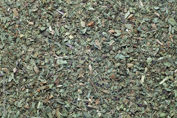 Obraz dried and chopped basil spice , food background
