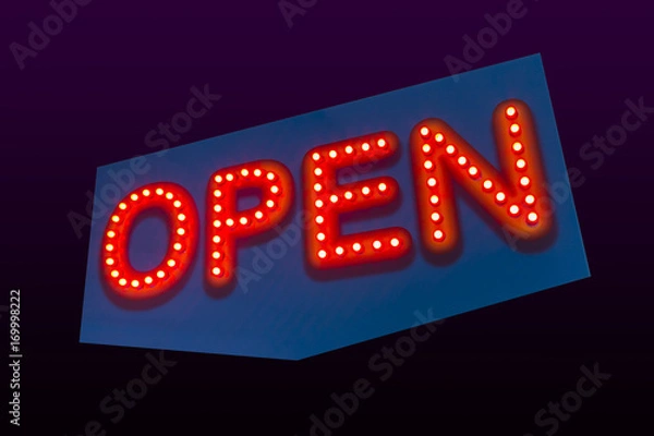 Fototapeta colorful led OPEN sign. isolated on dark background with clipping part