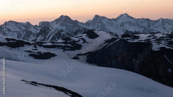 Fototapeta Sunrise on Mount Elbrus, view of the Observatory and mountains from the slope of Mount Elbrus, Russia
