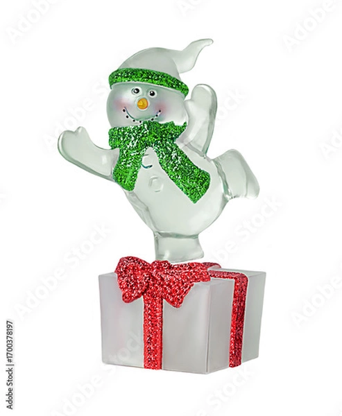 Obraz One cheerful snowman in a green scarf and hat and with a gift isolated on a white background