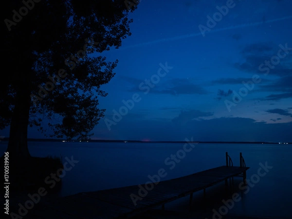Obraz cloudy night over lake