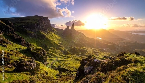 Fototapeta Snow-patched mountains, mist-filled valleys, evergreen forests, and sunlit meadows under a gradient sky, evoking serenity, natural diversity, and the quiet magic of dawn or dusk.