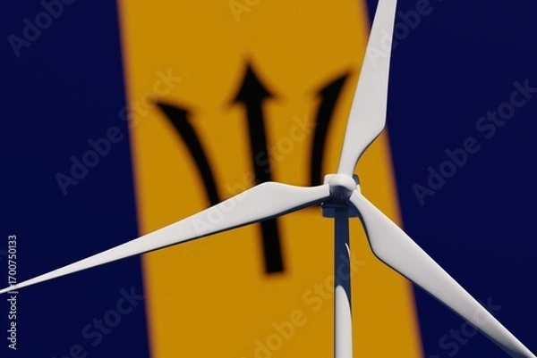 Fototapeta Wind turbine on a background of blurred flag of Barbados. Wind power concept, selective focus