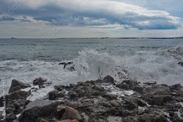Fototapeta Russia. The Far East. The Kuril Islands. The picturesque rocky coast of Iturup Island in the Sea of Okhotsk.