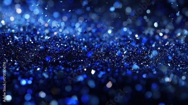 Fototapeta sapphire glitter bokeh background with shimmering royal blue sparkles and crystal droplets 