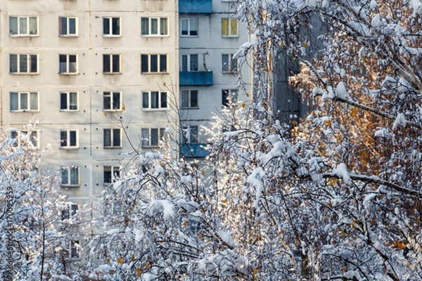 Fototapeta The winter urban view of  the post-soviet apartment building in Eastern Europe, Riga, Imanta, Latvia