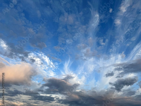 Obraz Sturmzerzauste Wolken im Abendlicht