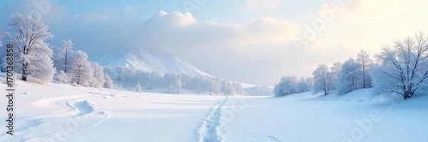 Fototapeta A perfectly still snow-covered landscape, untouched and serene; the quiet beauty of a winter morning's pristine silence forms a tranquil shape across the land ,  pristine,  natural beauty