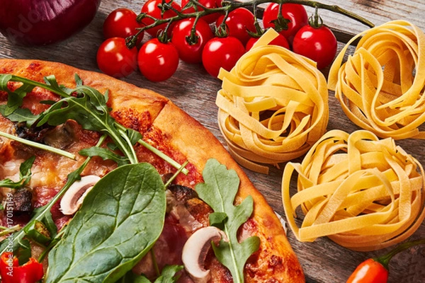 Obraz Part of pizza, cherrytomato, tagliatelle.