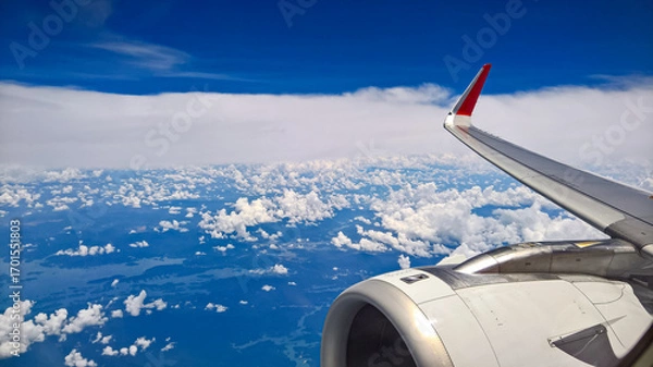 Fototapeta beautiful white clouds in nature blue sky in sunny day, view from a plane, look over South China Sea.