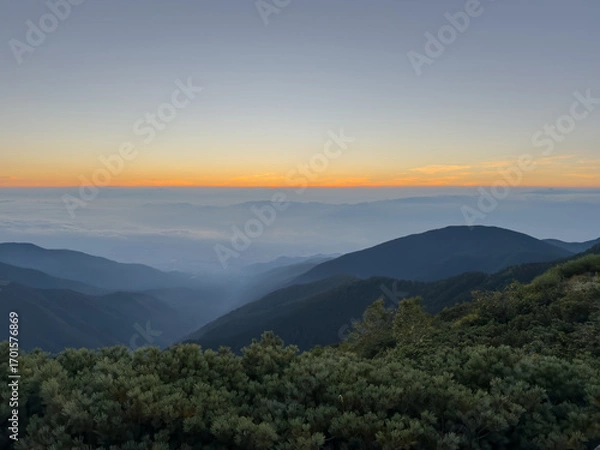 Obraz 蝶ヶ岳山頂から望む雲海に昇る日の出