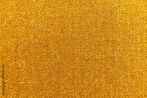 Fototapeta Texture of dense yellow fabric for tailoring. Canvas. Textile. Material