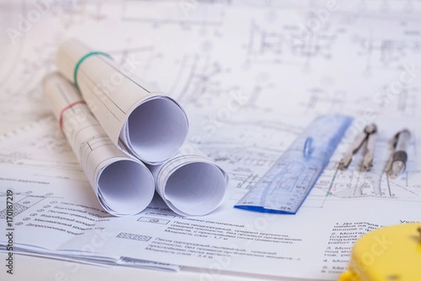 Obraz Design documentation is on the table. Tool for designers. Rolls