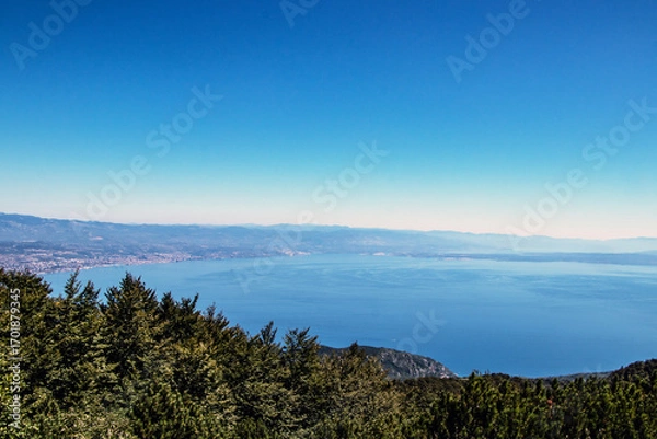 Fototapeta Clear sky over the Kvarner Bay with Rijeka port in the Adriatic Sea