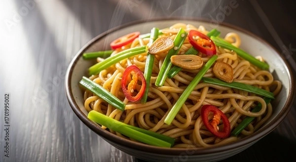 Fototapeta Steaming Noodles with Red Chilies and Green Onions in Bowl