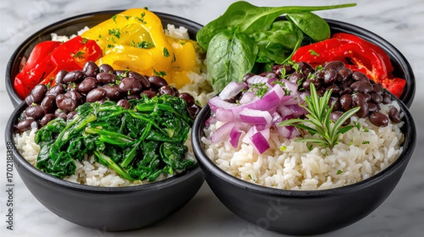 Fototapeta Colorful bowls of rice with vegetables and beans arranged attractively.