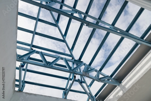 Fototapeta Structure of steel roof frame.