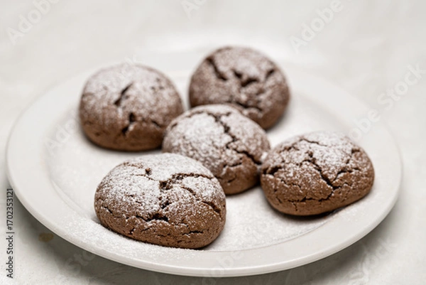 Fototapeta Delicious Chocolate Cookies with Cream Cheese Filling and Powdered Sugar Dusting