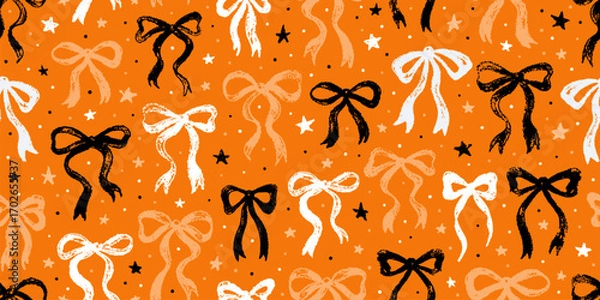 Fototapeta Pattern with bows. Halloween bow seamless print. Cute ribbon coquette vector. Black orange crayon Halloween background. Fall girly bg design. Hand drawn brush texture. Spooky kid wrapping paper