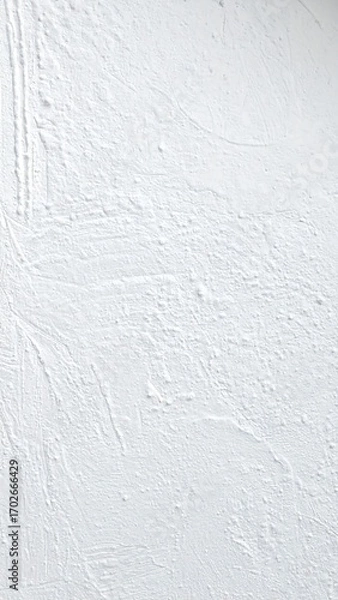 Fototapeta White textured wall, slight imperfections