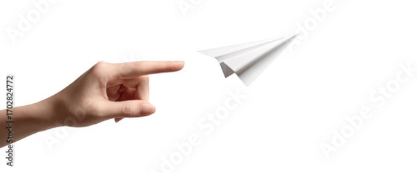 Fototapeta A hand launching a paper airplane