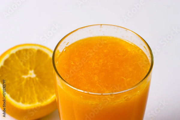 Obraz Pouring orange juice