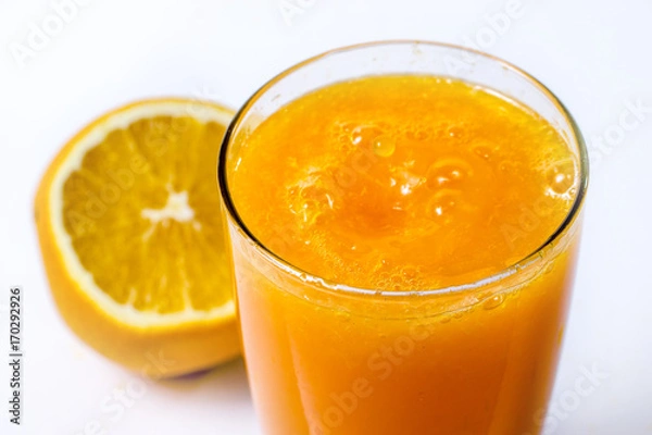 Obraz Pouring orange juice