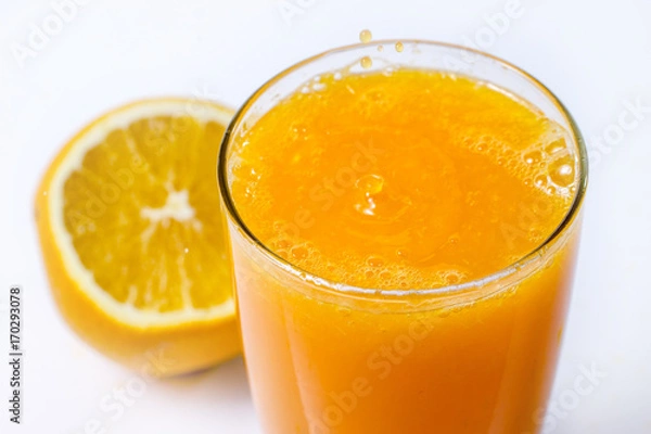 Obraz Pouring orange juice