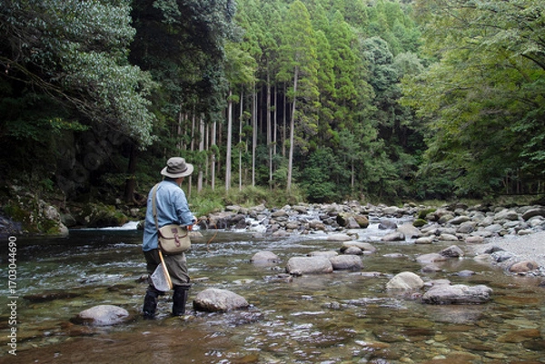Obraz フライフィッシングをする男性