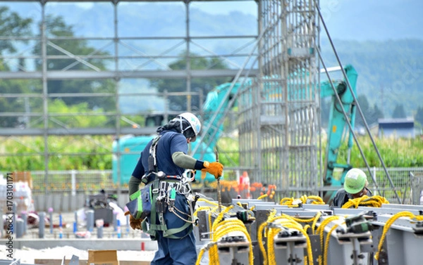 Obraz 建築工事現場で働く男たち