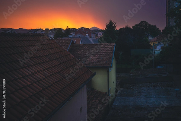 Obraz Balkan city at dusk with interesting colors in the sky