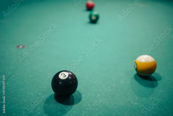 Obraz Billiard balls on the table, eight in focus