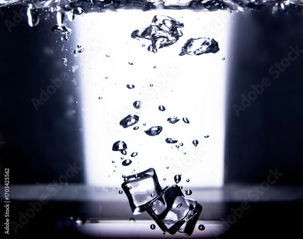 Fototapeta 1.High Contrast Ice Cubes in Water with Air Bubbles.