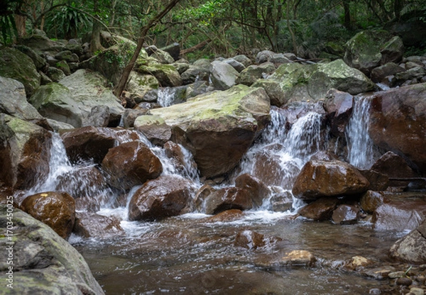 Obraz Close up of river flows between stone, in New Taipei City, Taiwan.