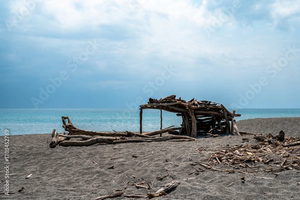 Obraz Lovely shelter made by woods standing in the beach, in Yilan, Taiwan.