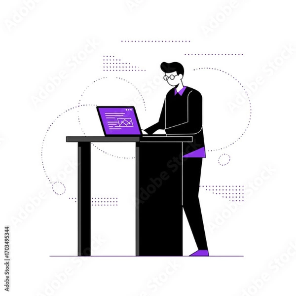 Fototapeta Man standing at a desk working on a laptop