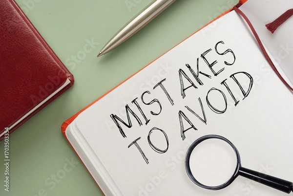 Fototapeta Mistakes to avoid message written on notebook page. Conceptual mistakes to avoids symbol