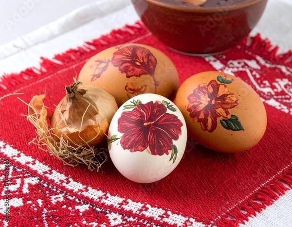 Obraz Painted Easter eggs on a red cloth