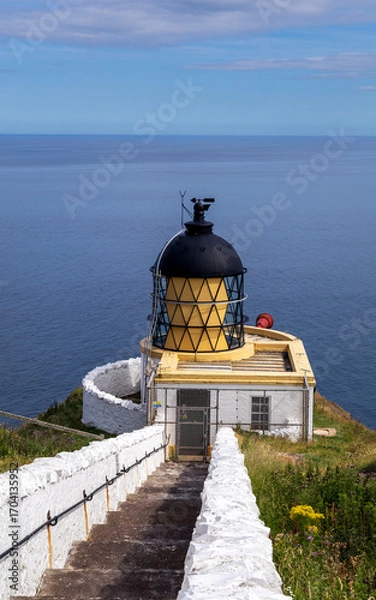 Obraz lighthouse guarding the Scottish coastline 