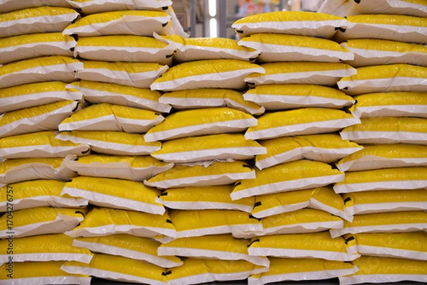 Fototapeta 山積みになった袋に入ったお米