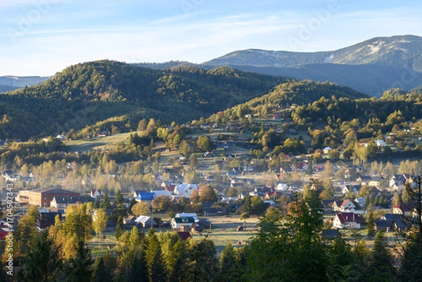 Fototapeta View of the village of Kosmach at dawning. Kosmach is a village located in the Carpathian Mountains, in Kosiv region, Ivano-Frankivsk Oblast, Ukraine. Autumn morning landscape.